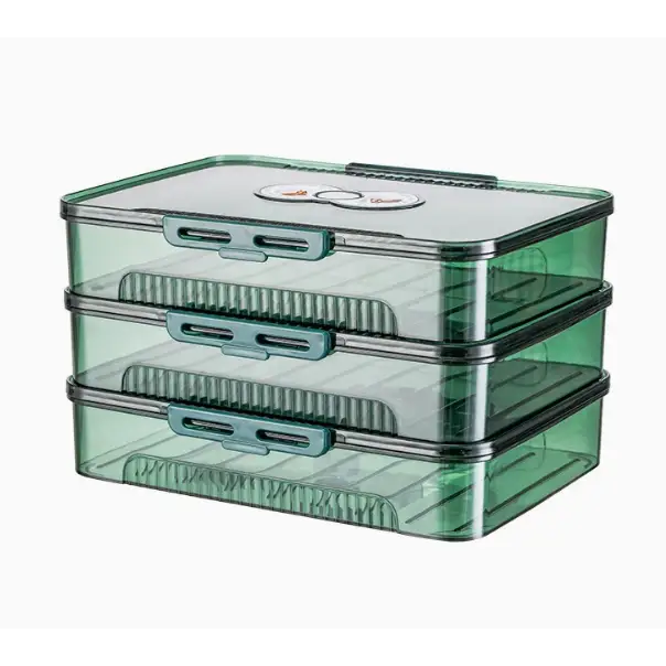 Stacked translucent green plastic storage drawers with teal and silver latches.