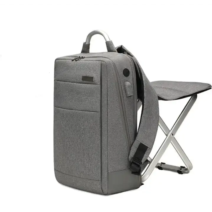 Gray textured fabric backpack with integrated foldable metal-framed stool.