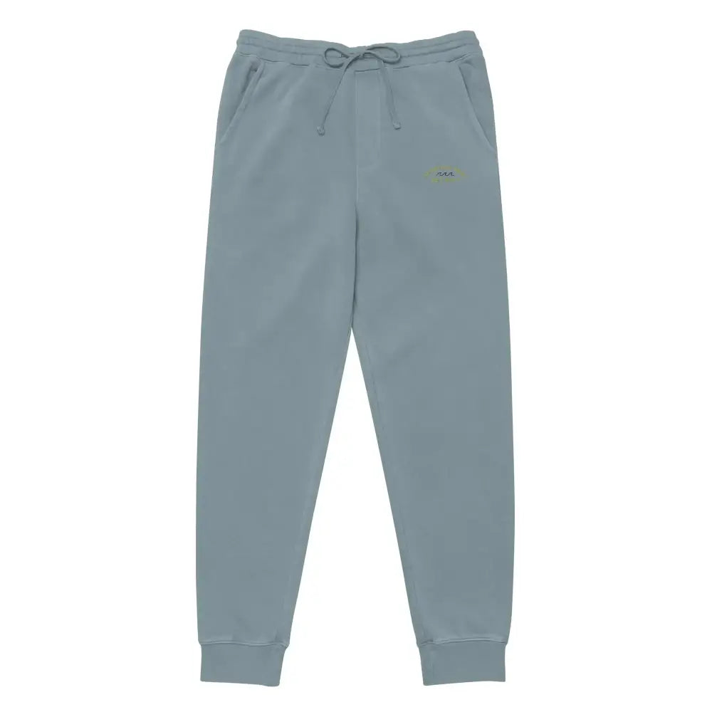 Light blue jogger pants with a drawstring waistband and subtle embroidered logo on the thigh.