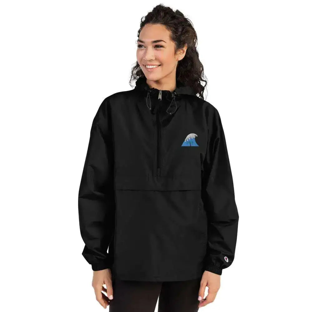 Black champion anorak with a blue and white wave logo on the chest.
