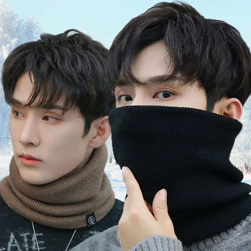 Black knitted neck warmer with ribbed texture and a small branded tag on the side