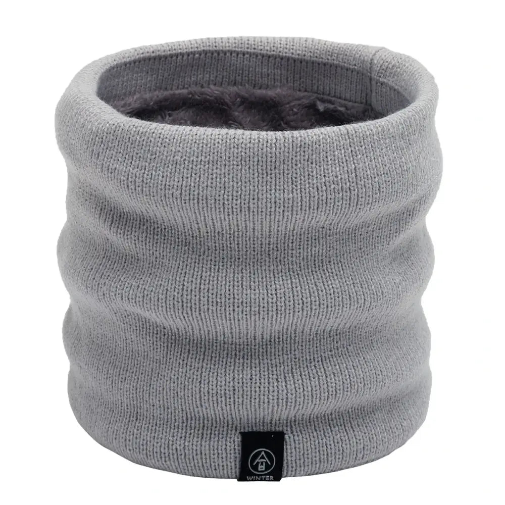Gray knitted winter neck warmer with a soft, plush inner lining.