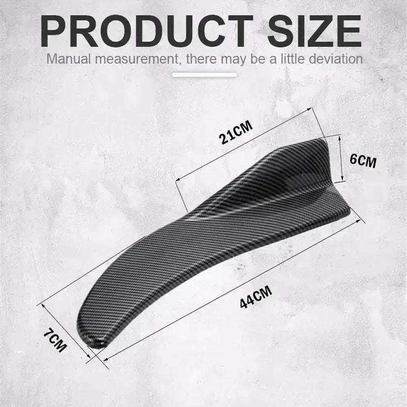 Black carbon fiber textured car spoiler.