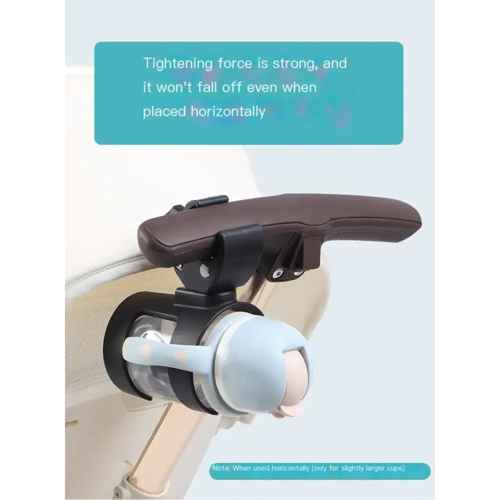 A sleek, black and brown baby bottle holder with a secure clamping mechanism designed to hold a light blue sippy cup.