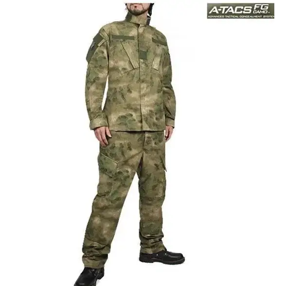 The atacs fg camouflage tactical uniform set, featuring a detailed digital pattern in shades of green and brown with reinforced pockets and durable fabric.