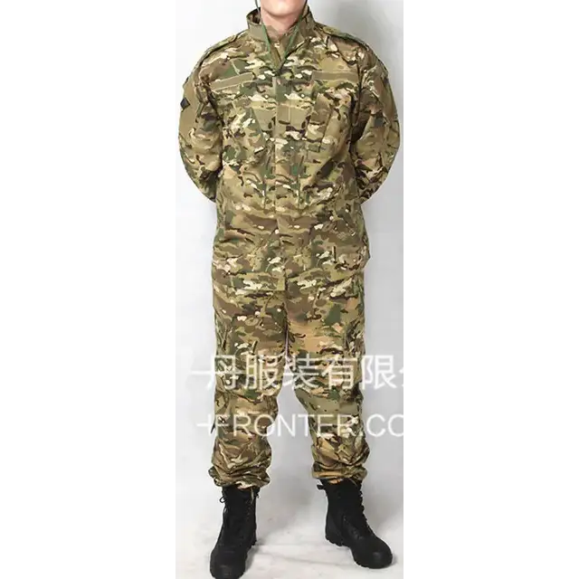 Camouflage military uniform in a multi-toned woodland pattern, made of durable fabric with multiple pockets and reinforced seams.