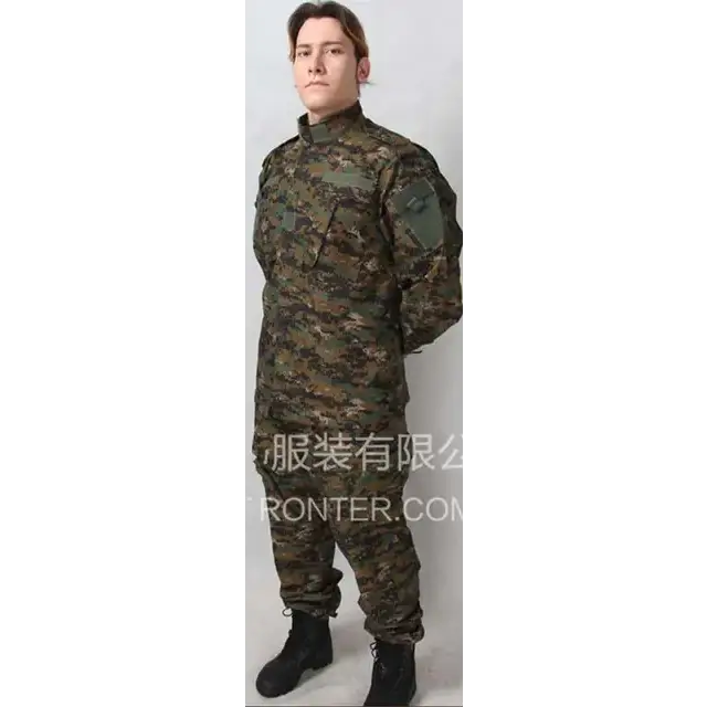 The man is wearing a green and brown digital camouflage military uniform with black combat boots.