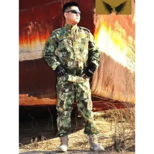 The man is wearing a green and brown woodland camouflage military uniform with matching pants, gloves, and boots.