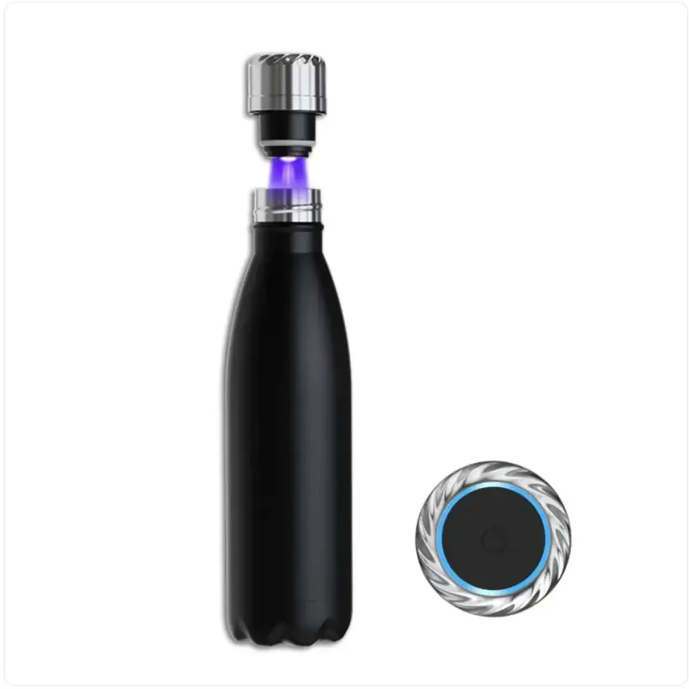 Black insulated water bottle with a silver-toned, textured cap emitting purple light and an accompanying circular base featuring a blue ring.