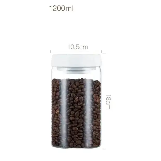 Clear glass coffee bean storage jar with a white lid, holding 1200ml of dark roasted beans.