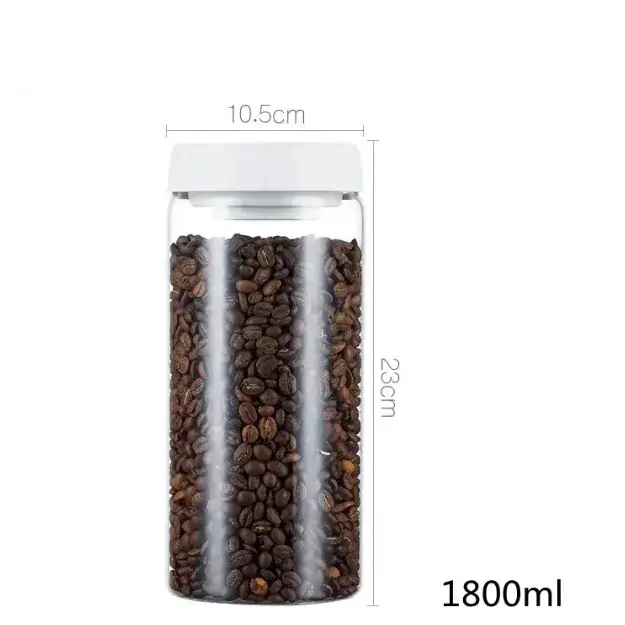 Transparent glass coffee bean storage jar with a white lid, holding 1800ml of dark roasted beans.