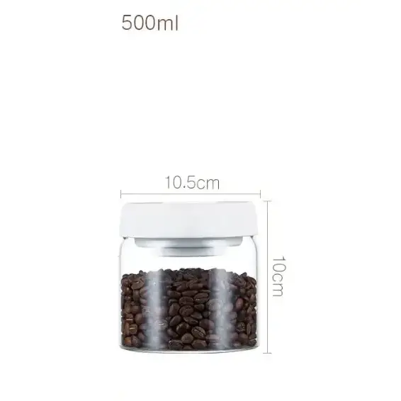 Clear glass coffee bean storage jar with a white lid, marked as 500ml capacity.
