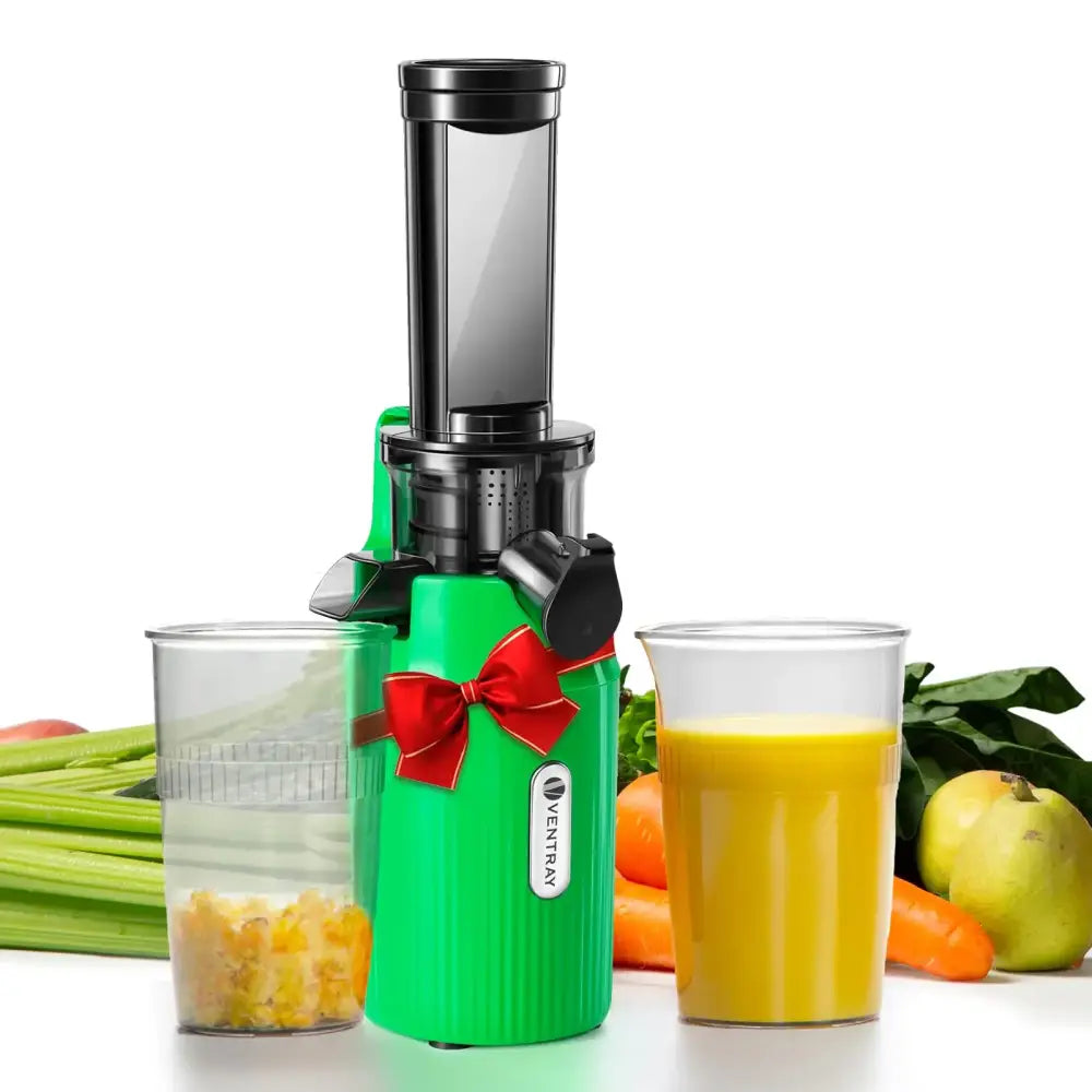 Green ventray juicer with black accents and a red ribbon tied around its base.