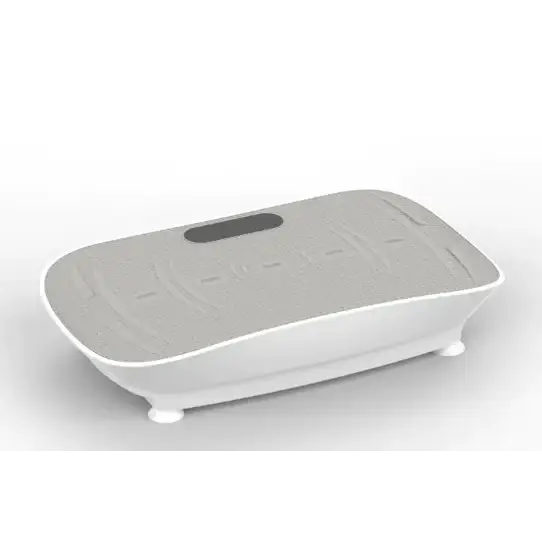 Gray and white vibration plate with textured surface and a black control panel.