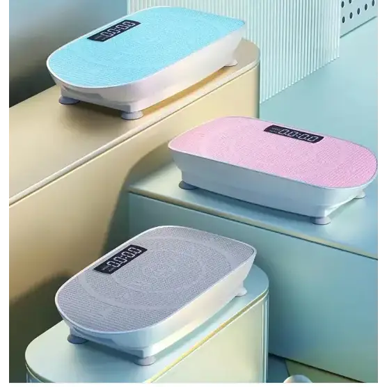 Three modern digital body fat scales, each with a textured fabric top in light blue, pink, and gray, set on tiered shelves.