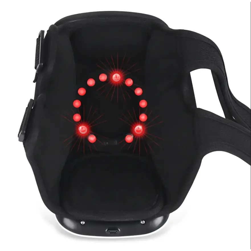 Black fabric-backed massage back brace with red led lights arranged in a circular pattern.