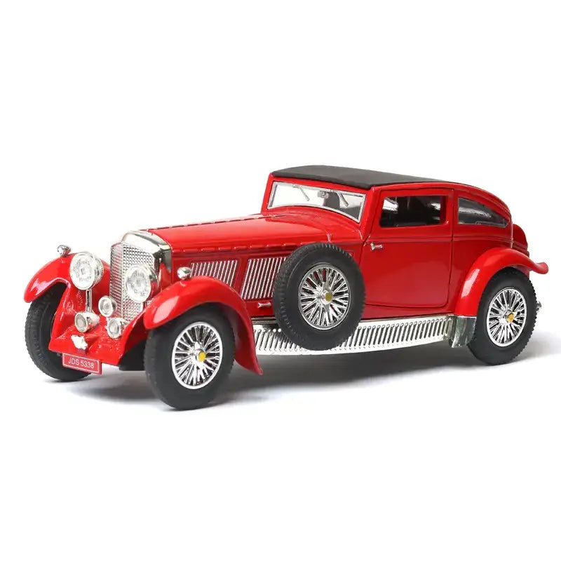 Red die-cast model of a classic luxury sedan with chrome accents and black roof.