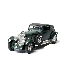 Dark green die-cast model of a classic bentley car with chrome accents and black roof.