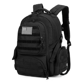 Black tactical backpack with a white american flag patch and multiple zippered compartments.