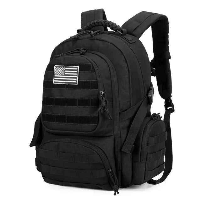 Black tactical backpack with a white american flag patch and multiple zippered compartments.