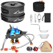 Black stacked camping cookware set with mountain logo and silver utensils
