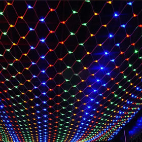 A colorful led light net with a diamond pattern, featuring vibrant red, blue, green, and orange lights strung along thin wires.