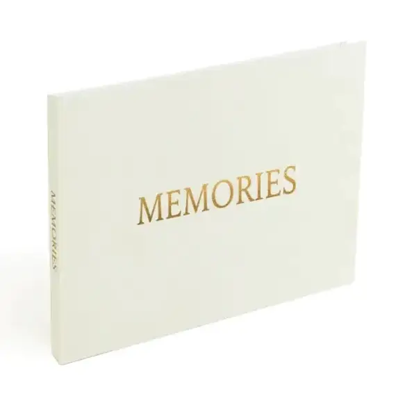 Cream-colored memory book with gold foil lettering.