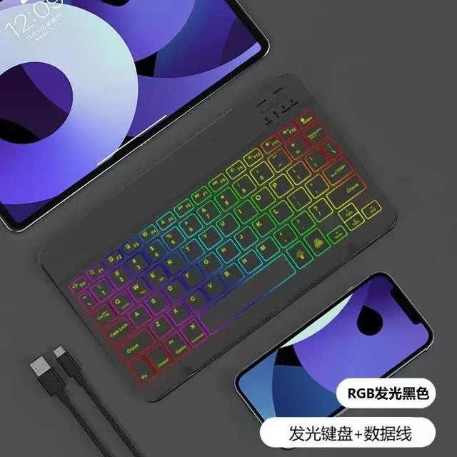 Black rgb-backlit keyboard with colorful illuminated keys and a sleek, modern design.