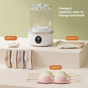 White compact laundry steamer with clear glass dome and digital display.