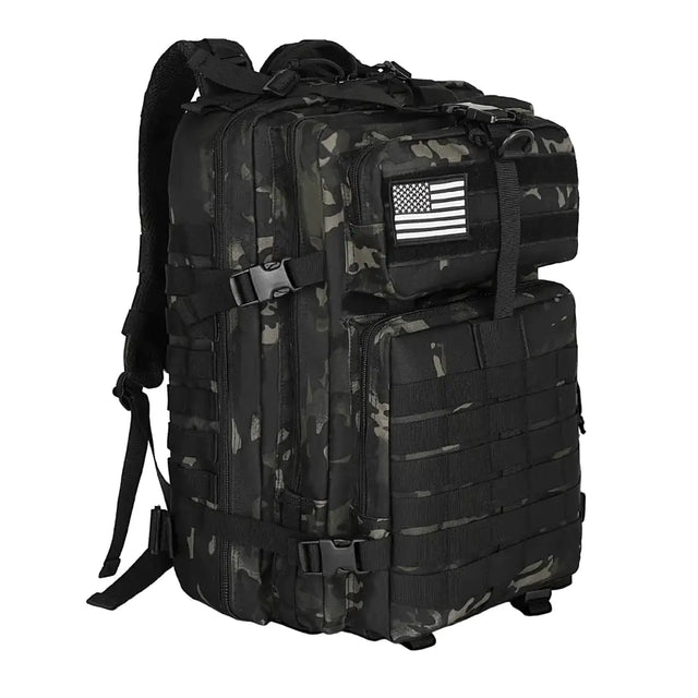 Black and gray camouflage tactical backpack with a white american flag patch on the front pocket.
