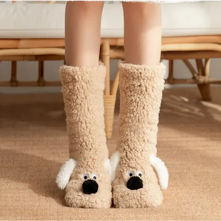 Beige fluffy dog-shaped knee-high socks with white ears and black nose.