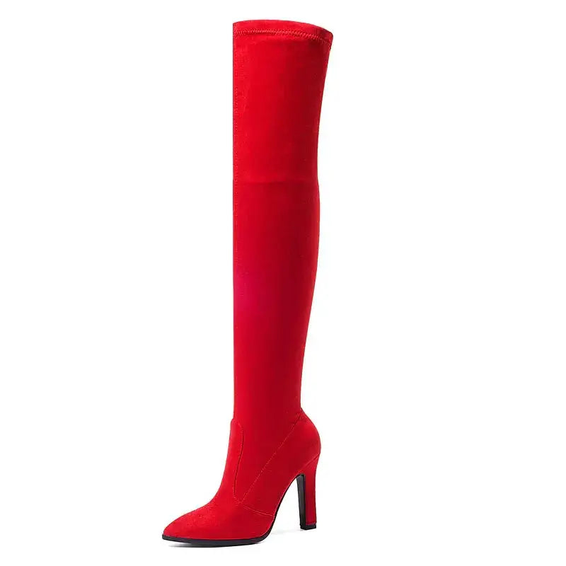 Vibrant red over-the-knee boot with a sleek, stretchy fabric upper and a black heel.
