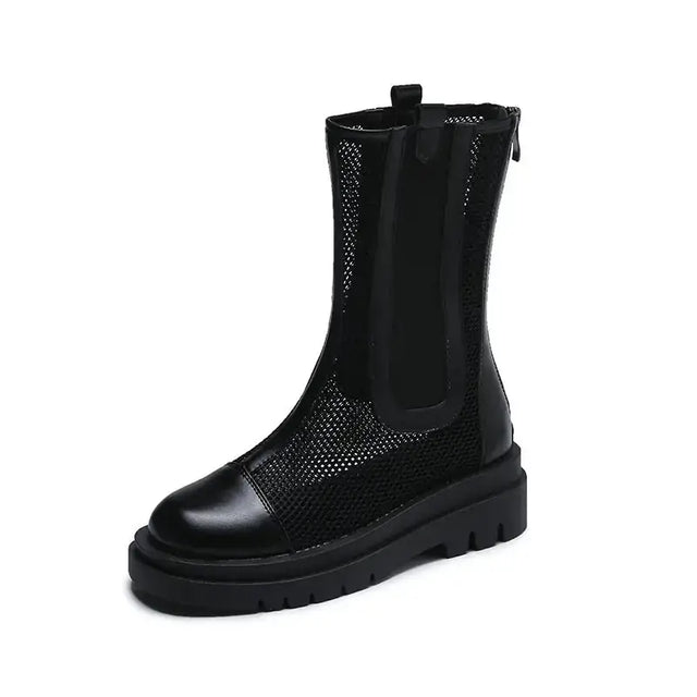 Black mesh ankle boot with a glossy leather toe cap and chunky rubber sole.