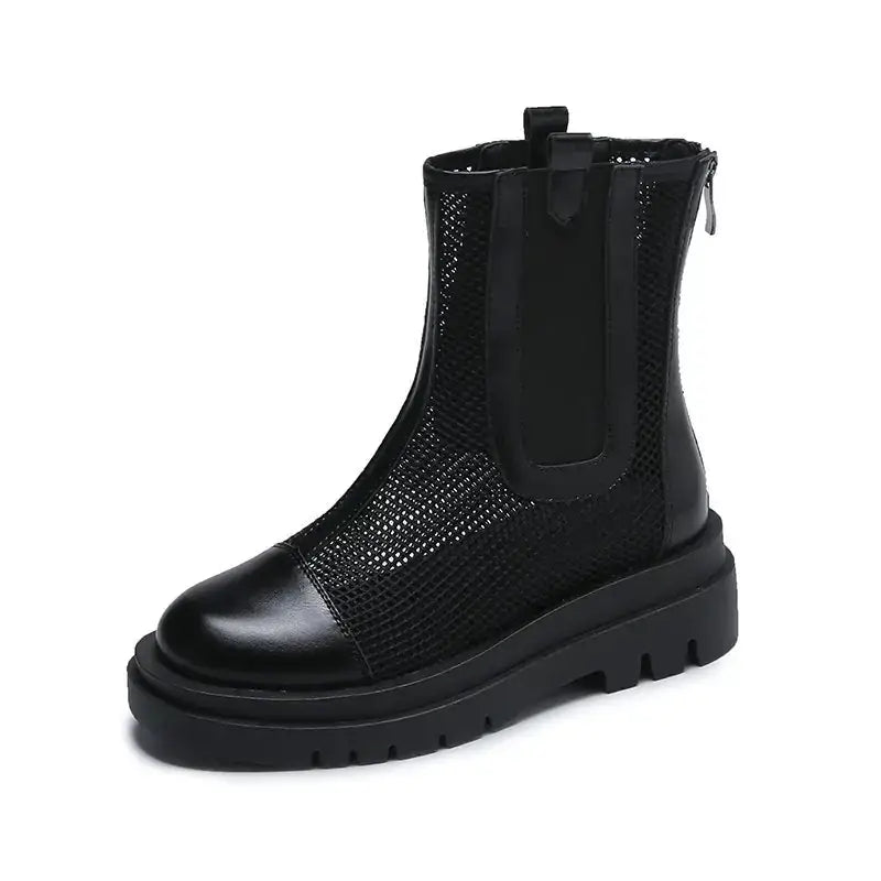 Black mesh ankle boot with a glossy leather toe cap and chunky rubber sole.