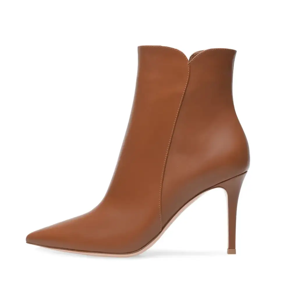 Tan leather ankle boot with a pointed toe and slim high heel.