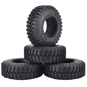 Black rubber off-road tires with aggressive tread patterns, designed for rugged terrain.