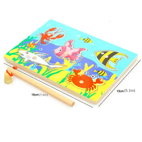 Colorful wooden underwater fishing puzzle board with cartoon fish, sharks, and crabs.