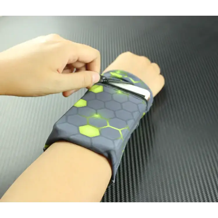 Gray and neon green hexagonal-patterned wrist phone holder with a zipper closure.