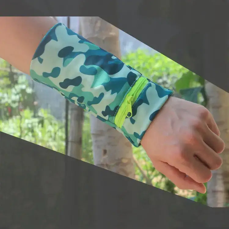 A teal and green camouflage-patterned wristband with a bright lime-green zipper.