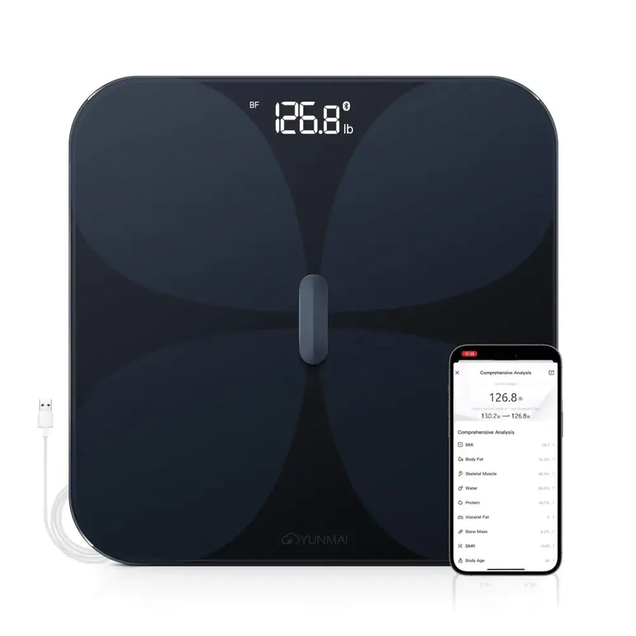 Black glossy smart scale with digital display showing body fat percentage and connected to a smartphone app.